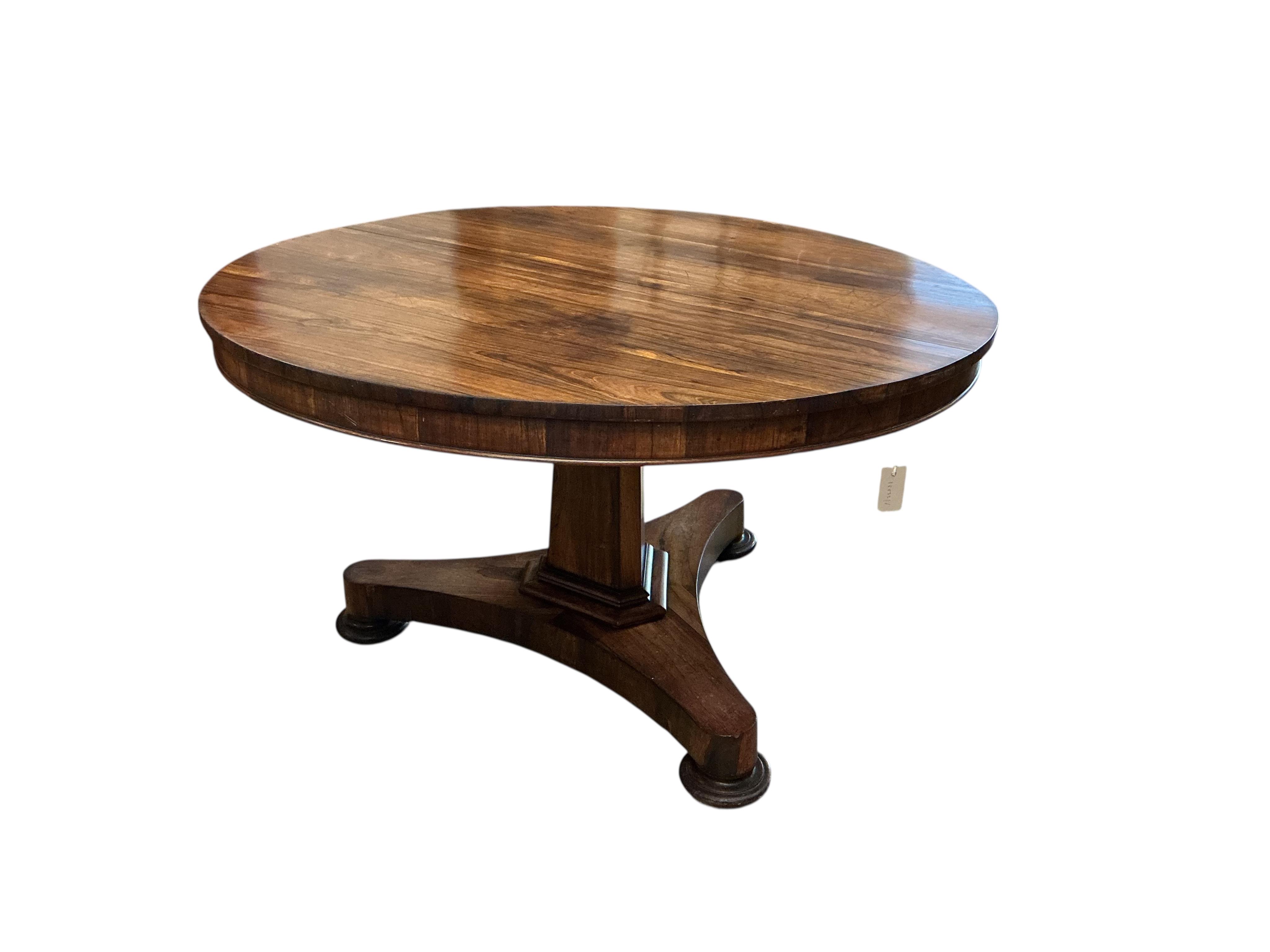 An early Victorian circular rosewood tilt top breakfast table, diameter 130cm, height 74cm